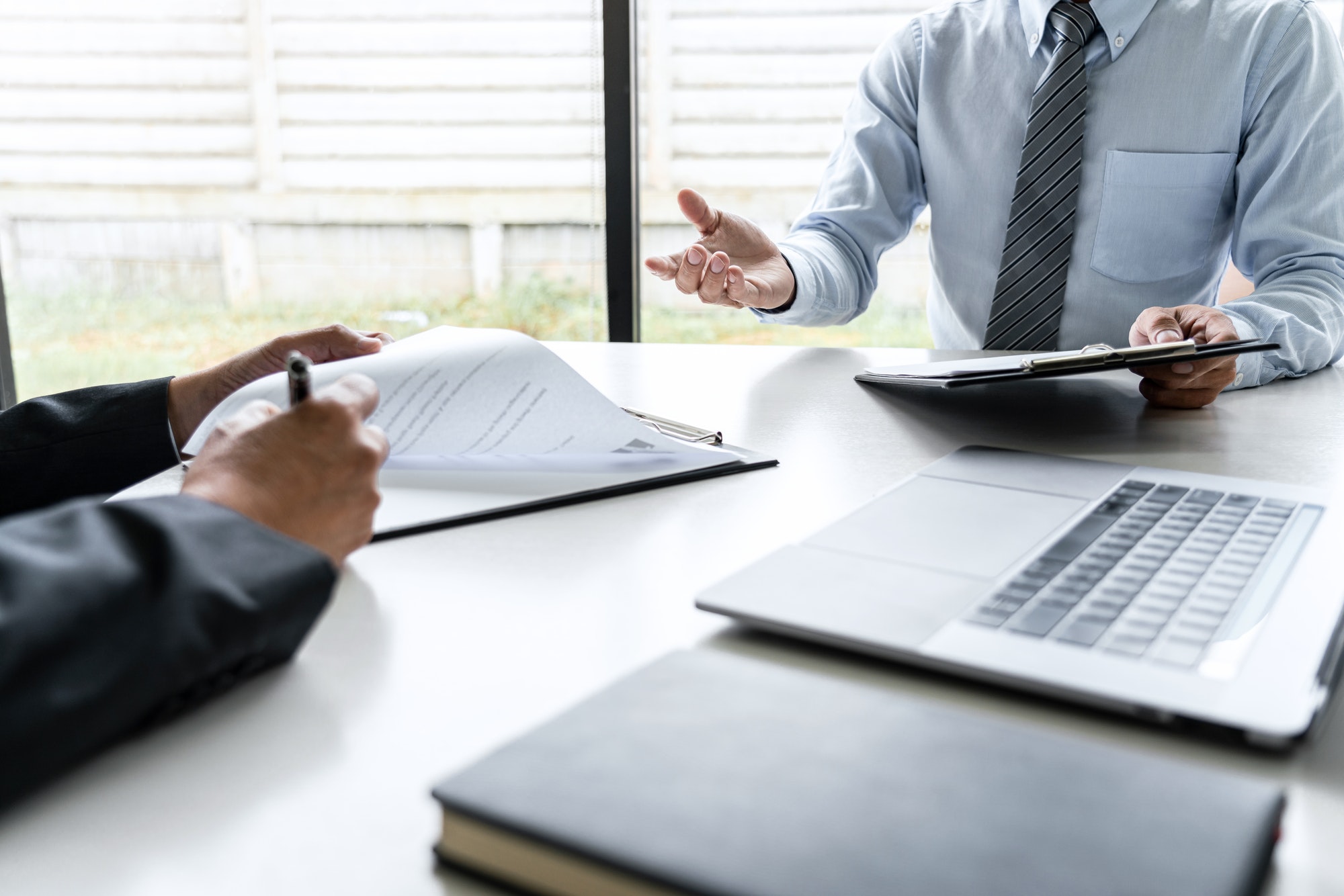 two men at a business meeting